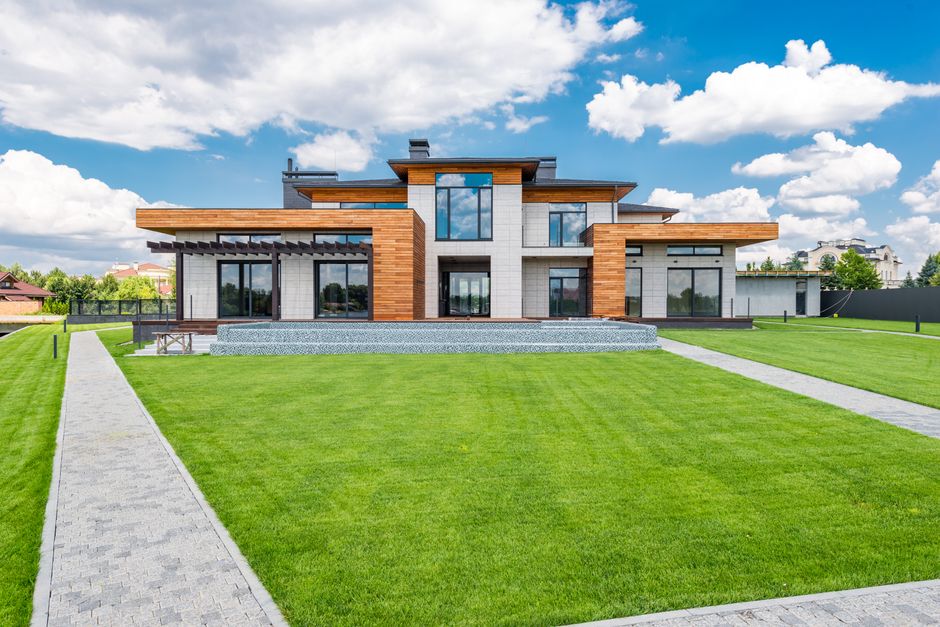 Contemporary residential home exterior with large windows